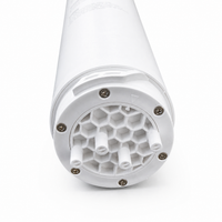 Close-up of aquaon aq100 water filter cartridge with a honeycomb pattern bottom
